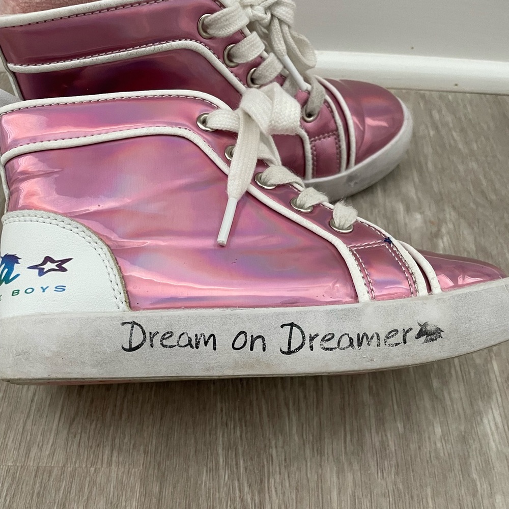 Lola and the Boys pink metallic distressed high top sneakers.